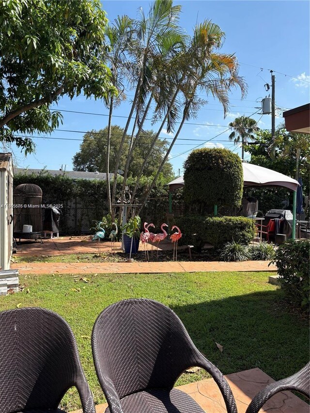 7430 Buchanan St, Hollywood, FL 33024 - view of grassy yard featuring a gazebo