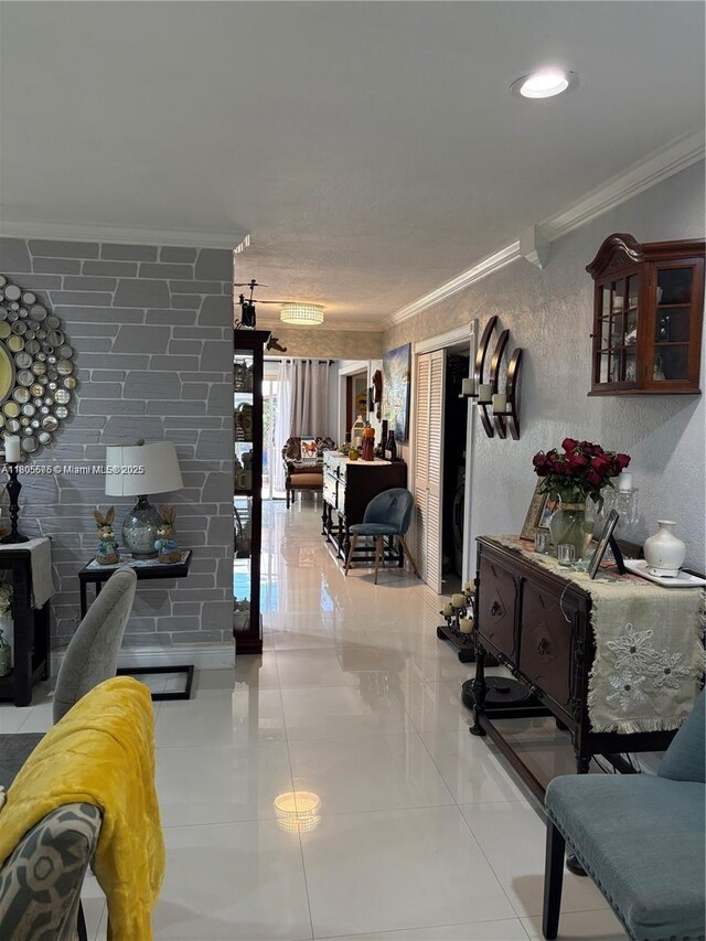 7430 Buchanan St, Hollywood, FL 33024 - living room featuring ornamental molding and light tile patterned floors