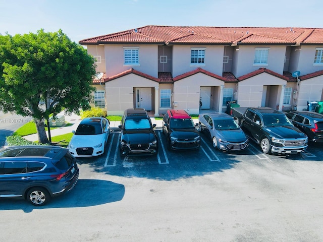 13729 SW 171st Ln, Miami, FL 33177 - mediterranean / spanish-style house featuring a tiled roof, uncovered parking, and stucco siding