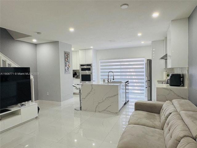 13729 SW 171st Ln, Miami, FL 33177 - living area featuring light marble finish flooring and recessed lighting