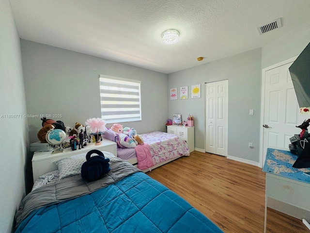 13729 SW 171st Ln, Miami, FL 33177 - bedroom with wood finished floors, a closet, and baseboards