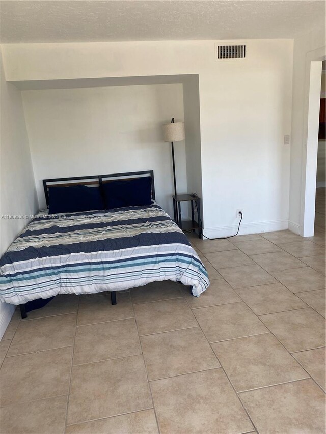 1424 SE 15th St Unit 45, Fort Lauderdale, FL 33316 - view of tiled bedroom