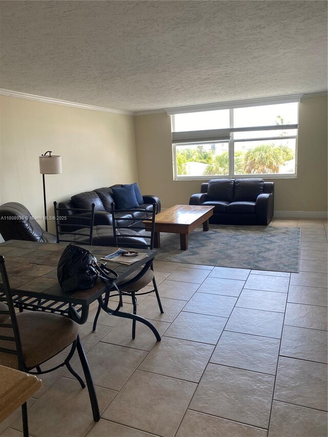 1424 SE 15th St Unit 45, Fort Lauderdale, FL 33316 - living room with crown molding, a textured ceiling, and light tile patterned floors