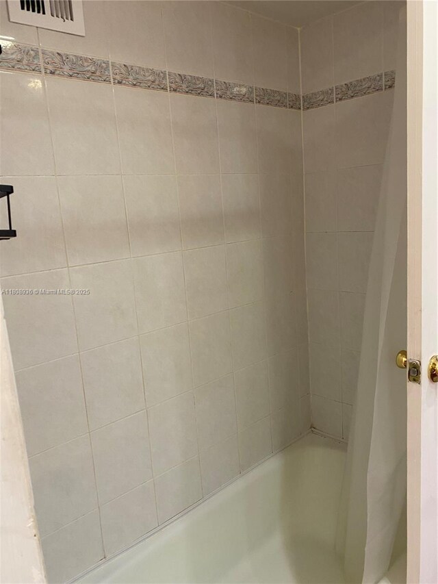 1424 SE 15th St Unit 45, Fort Lauderdale, FL 33316 - bathroom with shower / bathtub combination with curtain