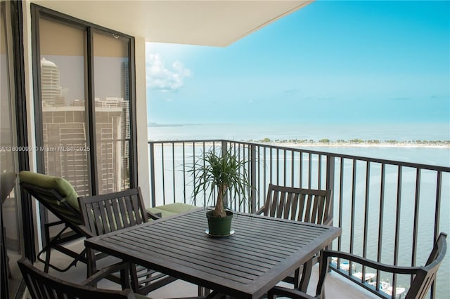 1865 Brickell Ave Unit A2111, Miami, FL 33129 - balcony featuring a water view and outdoor dining space