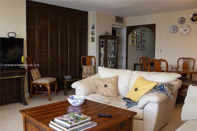 1865 Brickell Ave Unit A2111, Miami, FL 33129 - living area featuring arched walkways and light tile patterned floors