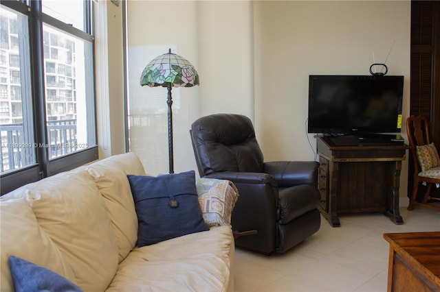1865 Brickell Ave Unit A2111, Miami, FL 33129 - living area featuring healthy amount of natural light and light tile patterned floors