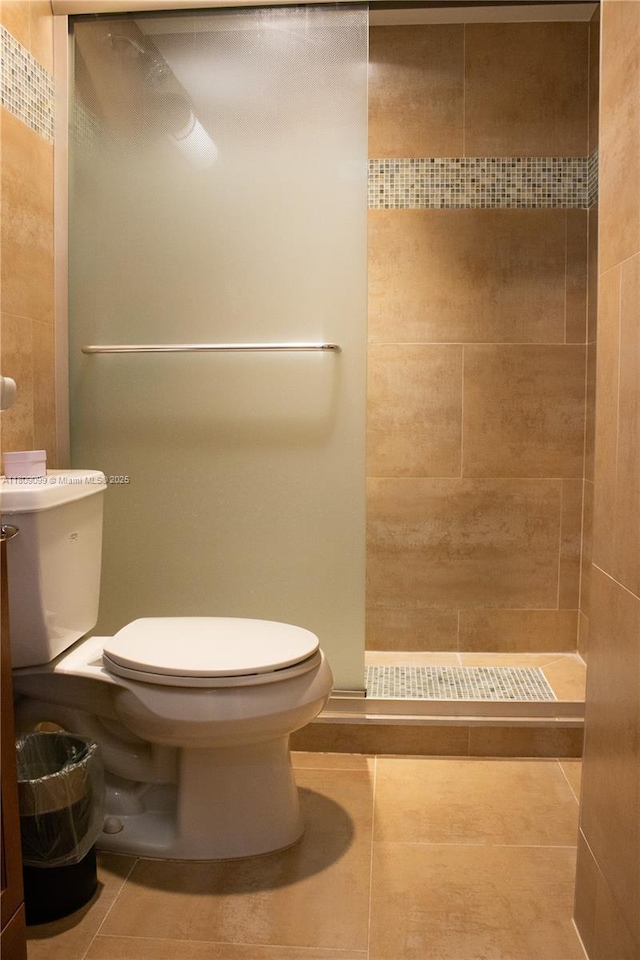 1865 Brickell Ave Unit A2111, Miami, FL 33129 - bathroom with toilet, a stall shower, and tile patterned flooring