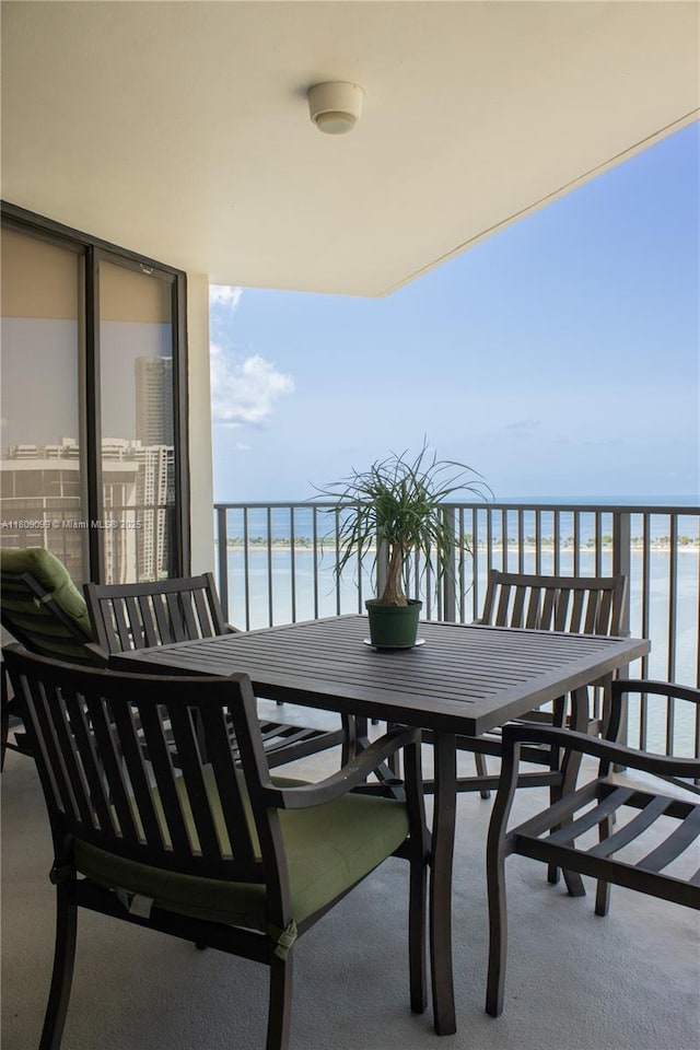 1865 Brickell Ave Unit A2111, Miami, FL 33129 - balcony featuring a water view and outdoor dining space