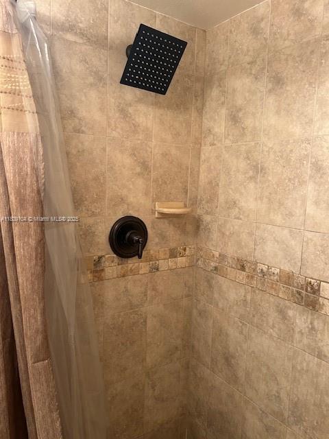 5326 NE 6th Ave Unit E23, Oakland Park, FL 33334 - bathroom view of tiled shower