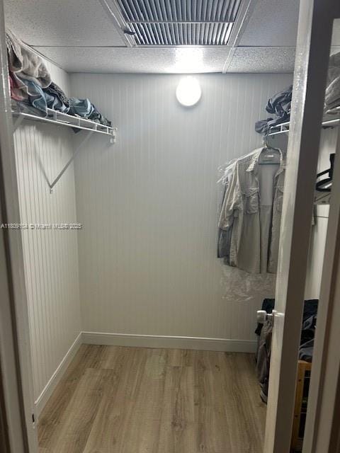 5326 NE 6th Ave Unit E23, Oakland Park, FL 33334 - walk in closet featuring wood finished floors