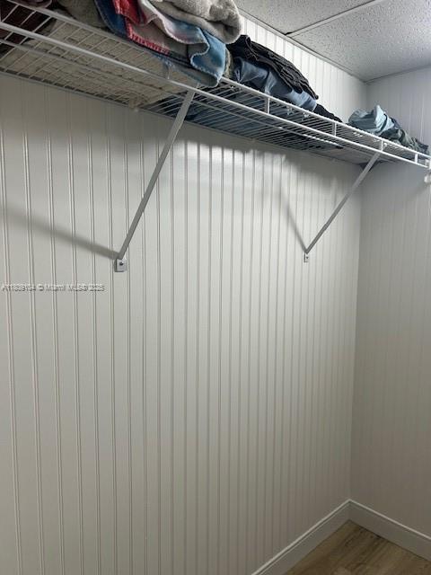5326 NE 6th Ave Unit E23, Oakland Park, FL 33334 - walk in closet featuring wood finished floors