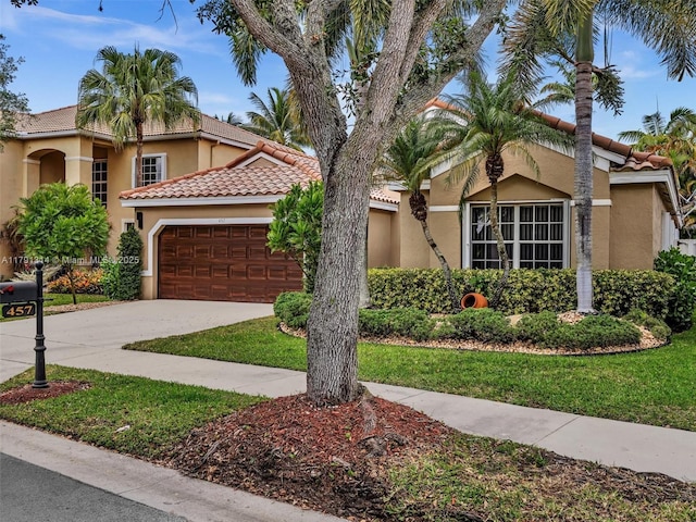 457 Cambridge Dr, Weston, FL 33326 - mediterranean / spanish-style home with an attached garage, stucco siding, a tile roof, and concrete driveway