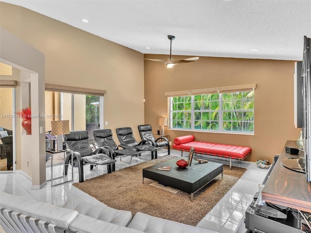 457 Cambridge Dr, Weston, FL 33326 - tiled living room featuring healthy amount of natural light, recessed lighting, a textured ceiling, baseboards, and a ceiling fan