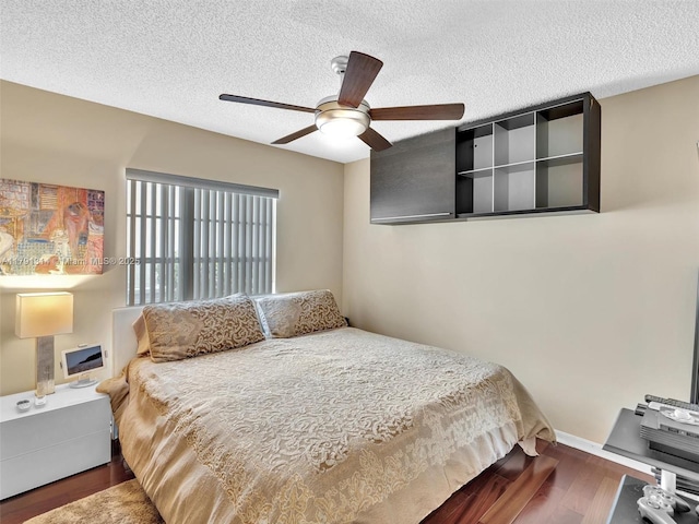 457 Cambridge Dr, Weston, FL 33326 - bedroom with wood finished floors, ceiling fan, and a textured ceiling