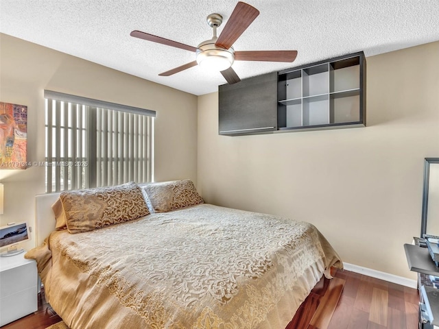 457 Cambridge Dr, Weston, FL 33326 - bedroom featuring wood finished floors, a textured ceiling, and ceiling fan