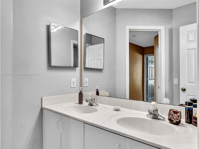 457 Cambridge Dr, Weston, FL 33326 - bathroom featuring double vanity