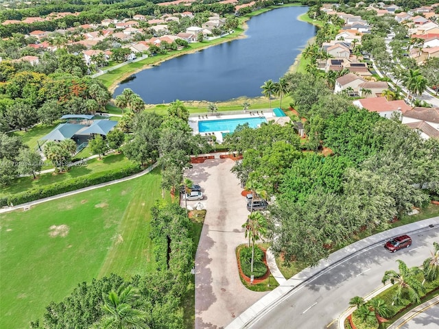 457 Cambridge Dr, Weston, FL 33326 - aerial view of property and surrounding area featuring a nearby body of water and nearby suburban area