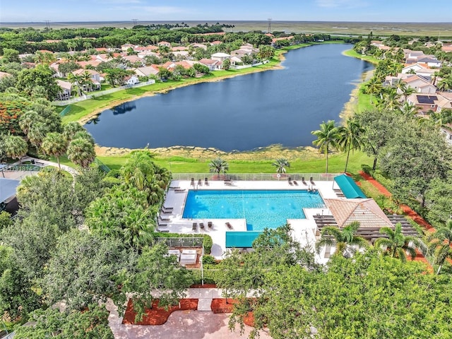 457 Cambridge Dr, Weston, FL 33326 - drone / aerial view of a large body of water and a pool area