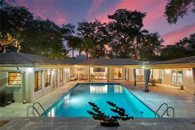 5465 Banyan Trl, Coral Gables, FL 33156 - swimming pool featuring a patio area, area for grilling, and french doors