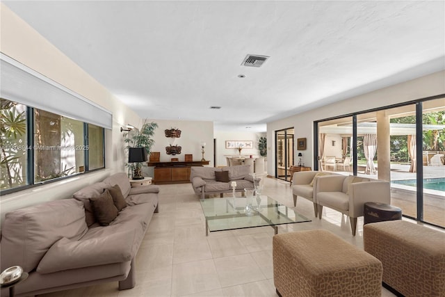 5465 Banyan Trl, Coral Gables, FL 33156 - living area with light tile patterned flooring