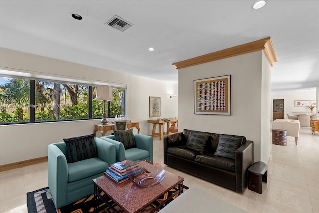 5465 Banyan Trl, Coral Gables, FL 33156 - living room with light tile patterned floors, recessed lighting, and baseboards