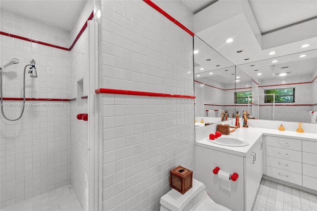 5465 Banyan Trl, Coral Gables, FL 33156 - bathroom featuring tile walls, a stall shower, vanity, recessed lighting, and tile patterned flooring