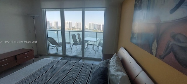 18100 N Bay Rd Unit Ph7, Sunny Isles Beach, FL 33160 - bedroom featuring access to outside, a city view, and tile patterned floors