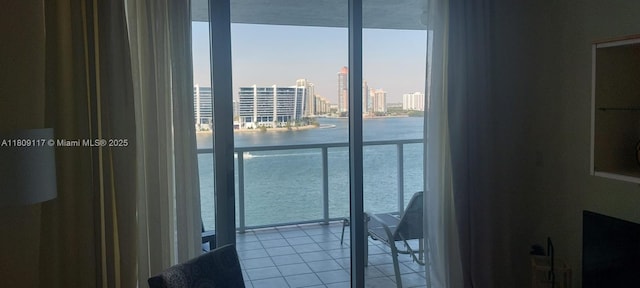 18100 N Bay Rd Unit Ph7, Sunny Isles Beach, FL 33160 - interior space featuring a wall of windows, a water view, a view of city, and tile patterned flooring