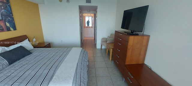 18100 N Bay Rd Unit Ph7, Sunny Isles Beach, FL 33160 - bedroom featuring light tile patterned floors and connected bathroom