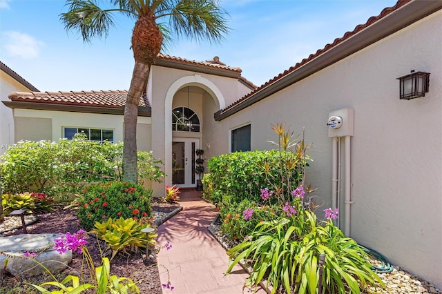 7259 Via Palomar, Boca Raton, FL 33433 - property entrance with a tile roof and stucco siding