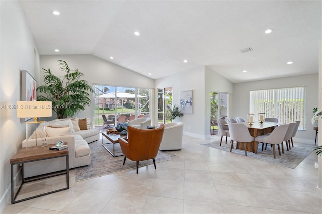 7259 Via Palomar, Boca Raton, FL 33433 - living room with vaulted ceiling, recessed lighting, healthy amount of natural light, baseboards, and light tile patterned flooring
