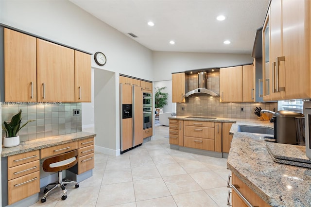 7259 Via Palomar, Boca Raton, FL 33433 - kitchen featuring wall chimney exhaust hood, a sink, vaulted ceiling, black electric stovetop, and tasteful backsplash