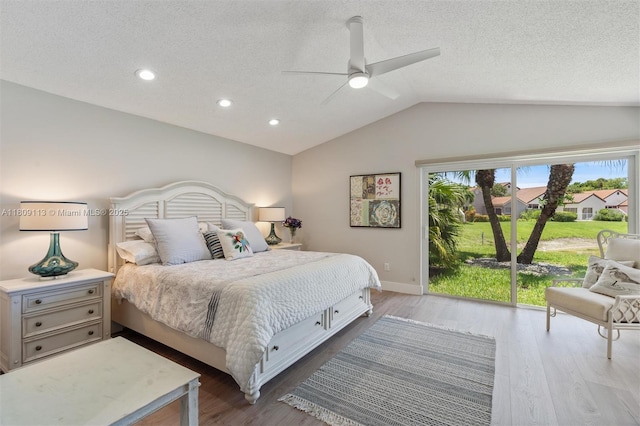 7259 Via Palomar, Boca Raton, FL 33433 - bedroom featuring lofted ceiling, access to exterior, wood finished floors, baseboards, and recessed lighting