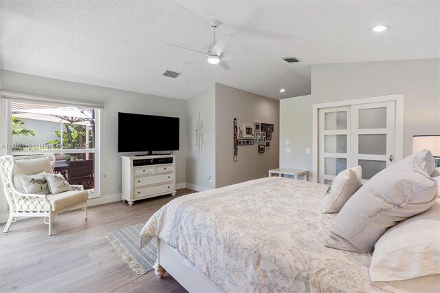 7259 Via Palomar, Boca Raton, FL 33433 - bedroom with vaulted ceiling, wood finished floors, baseboards, recessed lighting, and a ceiling fan
