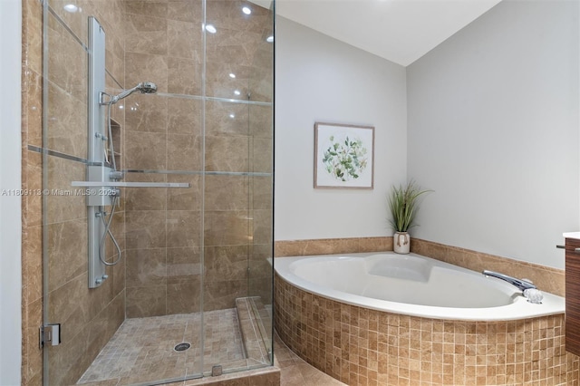 7259 Via Palomar, Boca Raton, FL 33433 - bathroom featuring a garden tub, a stall shower, and lofted ceiling