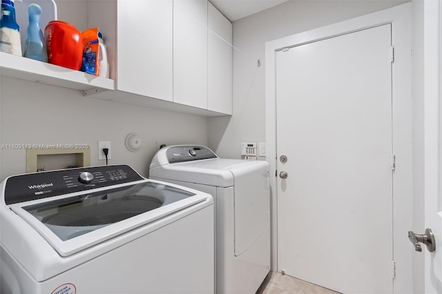 7259 Via Palomar, Boca Raton, FL 33433 - laundry room with cabinet space, washer and dryer, and light tile patterned floors