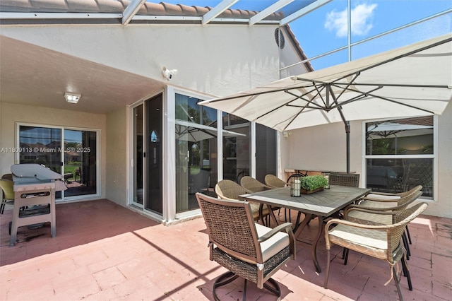 7259 Via Palomar, Boca Raton, FL 33433 - view of patio featuring a lanai, area for grilling, and outdoor dining space