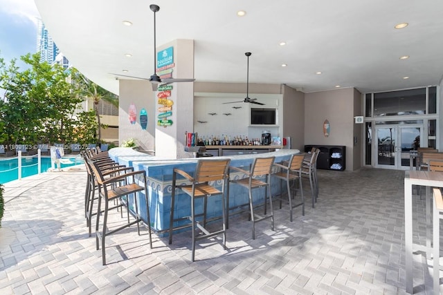 17375 Collins Ave Unit 1108, Sunny Isles Beach, FL 33160 - kitchen with recessed lighting, ceiling fan, and carpet