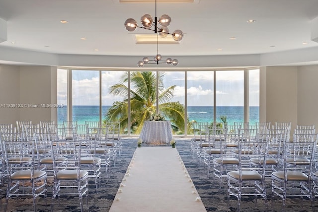 17375 Collins Ave Unit 1108, Sunny Isles Beach, FL 33160 - view of swimming pool featuring a water view and a chandelier