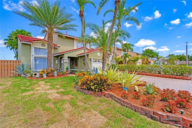 10213 SW 156th Ave, Miami, FL 33196 - view of front facade with a garage, stucco siding, and a tile roof