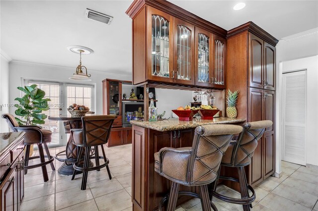 10213 SW 156th Ave, Miami, FL 33196 - indoor dry bar with ornamental molding, light tile patterned floors, and decorative light fixtures