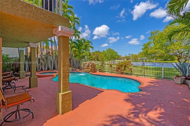 10213 SW 156th Ave, Miami, FL 33196 - view of pool with a patio area, a fenced backyard, and a pool with connected hot tub
