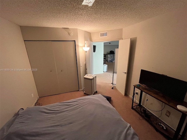 9144 W Atlantic Blvd Unit 832, Coral Springs, FL 33071 - bedroom with carpet, a closet, and a textured ceiling