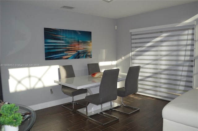 2220 NW 137th Ave, Sunrise, FL 33323 - dining space featuring dark wood-style floors and baseboards