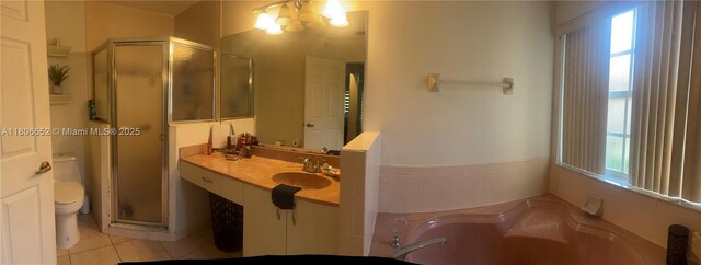 2220 NW 137th Ave, Sunrise, FL 33323 - full bathroom featuring a shower stall, vanity, a garden tub, toilet, and tile patterned flooring