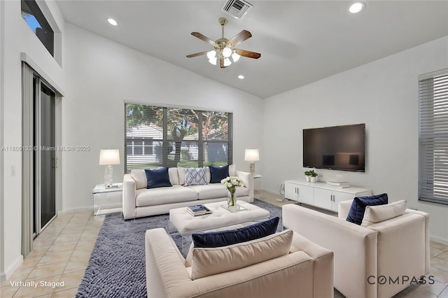 11564 Puerto Blvd, Boynton Beach, FL 33437 - living room with a ceiling fan, light tile patterned flooring, baseboards, recessed lighting, and high vaulted ceiling