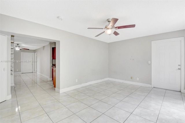 6160 Camp Lee Rd, West Palm Beach, FL 33417 - spare room featuring ceiling fan, light tile patterned floors, baseboards, and a smoke detector