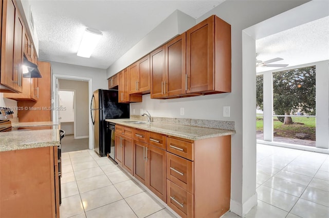 6160 Camp Lee Rd, West Palm Beach, FL 33417 - kitchen featuring a textured ceiling, under cabinet range hood, a ceiling fan, light tile patterned floors, and a sink