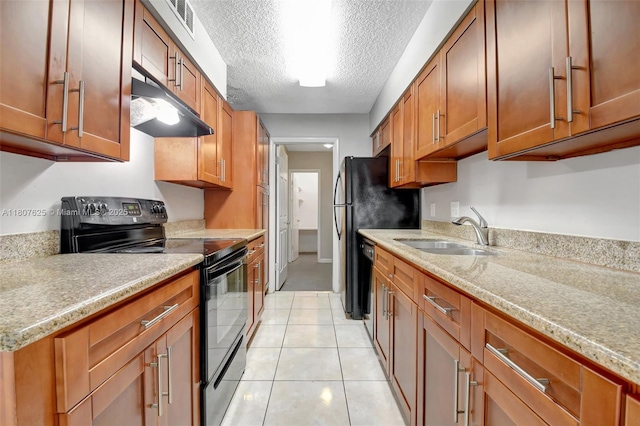 6160 Camp Lee Rd, West Palm Beach, FL 33417 - kitchen with black electric range oven, a sink, under cabinet range hood, a textured ceiling, and brown cabinets